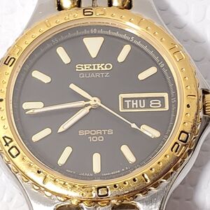 Vintage Seiko Men's Day Date Quartz Watch Black Dial Gold Tone Stainless Steel